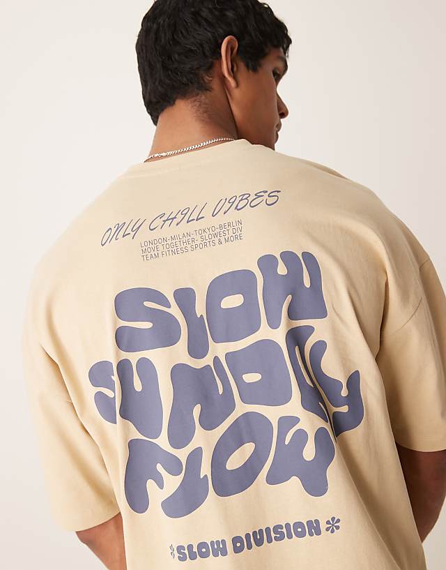 asos ASOS DESIGN oversized drop shoulder t-shirt with slow sunday graphic in khaki