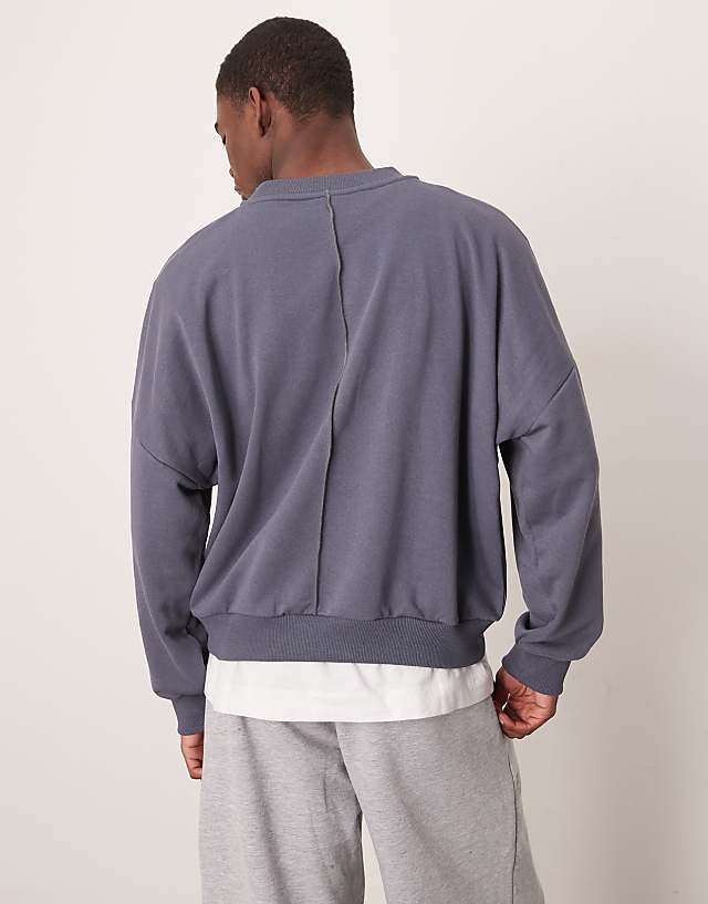 Asos ASOS DESIGN Oversized Dropped Shoulder Boxy Sweatshirt With Contrast Stitching In Charcoal