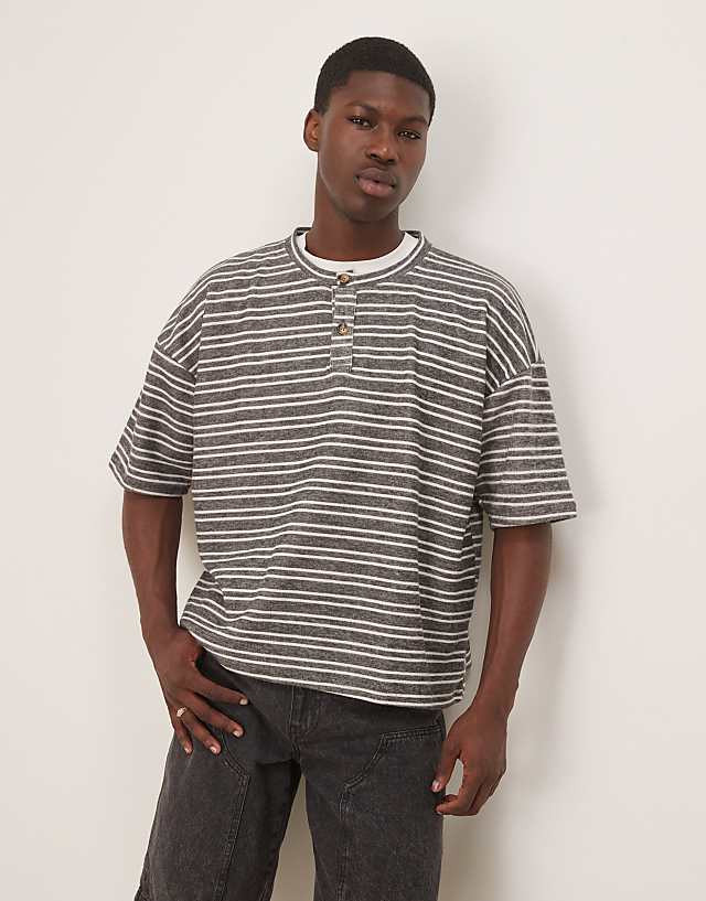 asos ASOS DESIGN oversized dropped shoulder henley t-shirt in striped rib