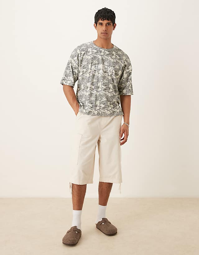 Asos ASOS DESIGN Oversized Dropped Shoulder T-shirt In Camo Print