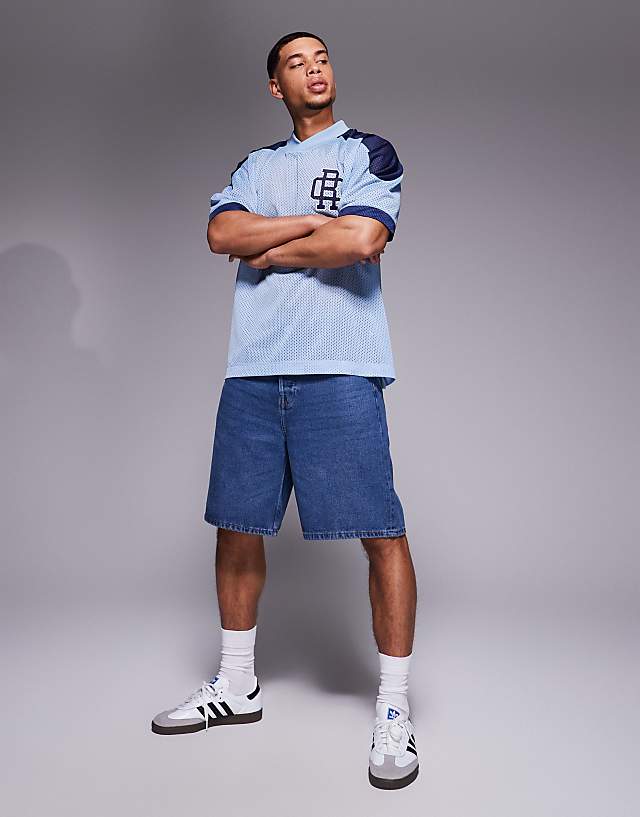 Asos ASOS DESIGN Oversized Dropped Shoulder T Shirt With Sports Graphic In Blue