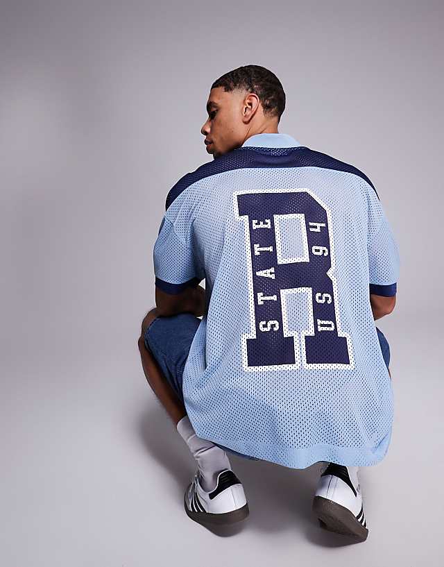 asos ASOS DESIGN oversized dropped shoulder t shirt with sports graphic in blue