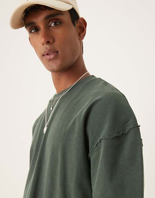 Asos ASOS DESIGN Oversized Half Sleeve T-shirt With Raw Hem In Dark Green