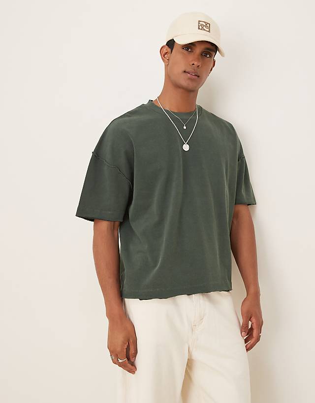 asos ASOS DESIGN oversized half sleeve t-shirt with raw hem in dark green