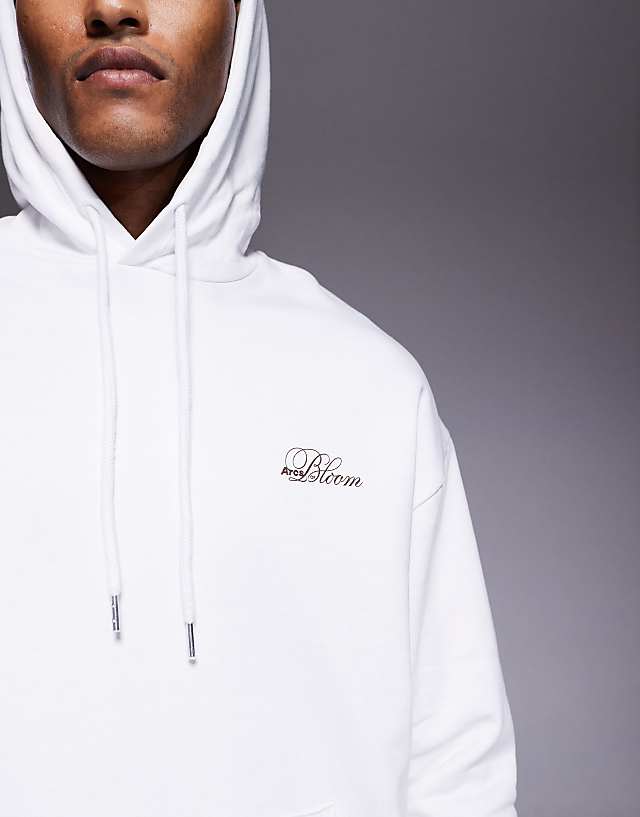 Asos ASOS DESIGN Oversized Hoodie With Floral Prints In White