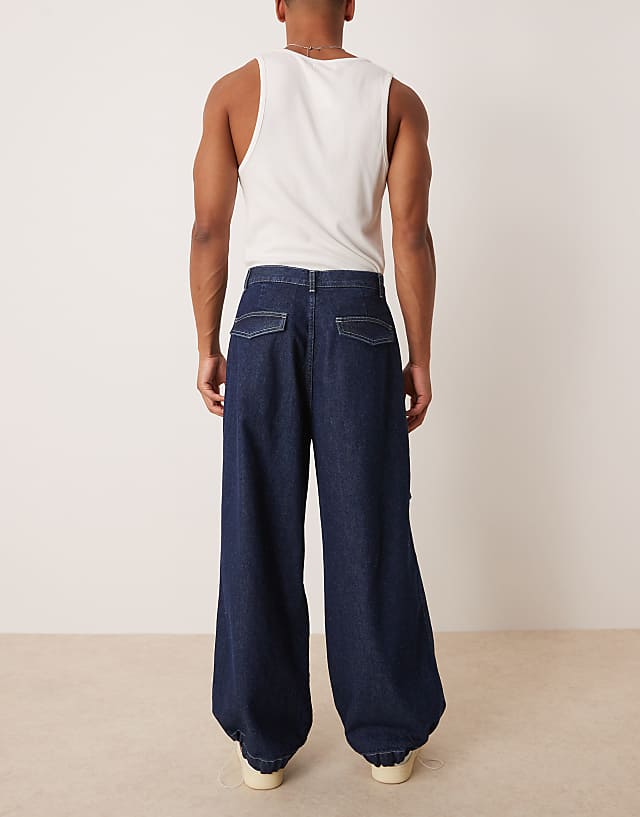 Asos ASOS DESIGN Oversized Parachute Jeans With Drawstring And Contrast Stitch In Raw Wash
