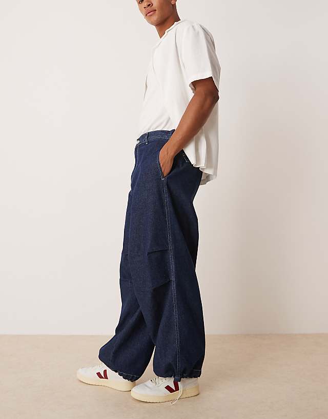 Asos ASOS DESIGN Oversized Parachute Jeans With Drawstring And Contrast Stitch In Raw Wash
