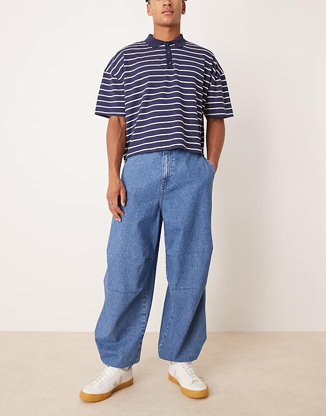 asos ASOS DESIGN oversized parachute jeans with drawstring and contrast stitch in mid wash blue