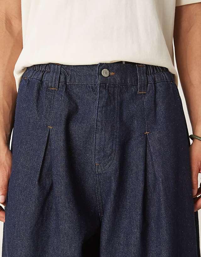 Asos ASOS DESIGN Oversized Parachute Jeans With Pleat Detail In Raw Wash