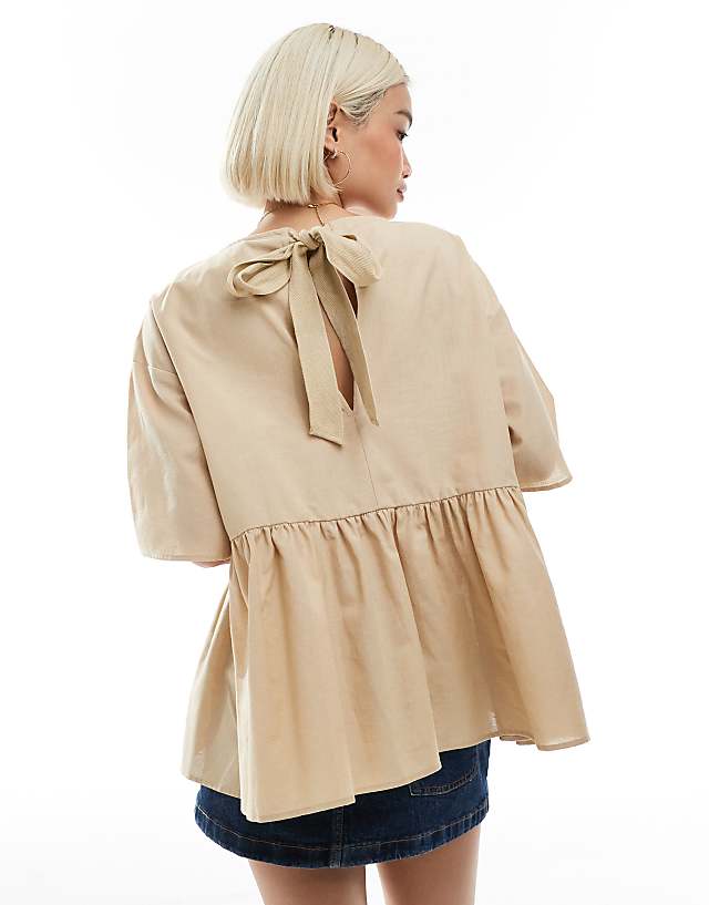 Asos ASOS DESIGN Oversized Peplum Short Sleeve Smock In Linen Blend In Stone