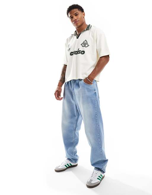 Asos ASOS DESIGN Oversized Polo Shirt In Off White With Paraiso Front Print