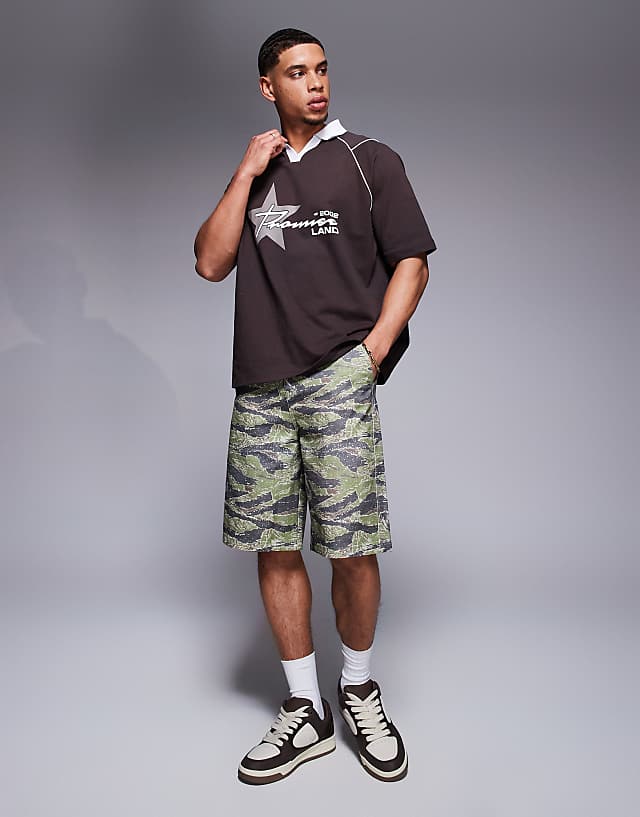 Asos ASOS DESIGN Oversized Polo With Sports Graphics And Airtex Panelling In Brown