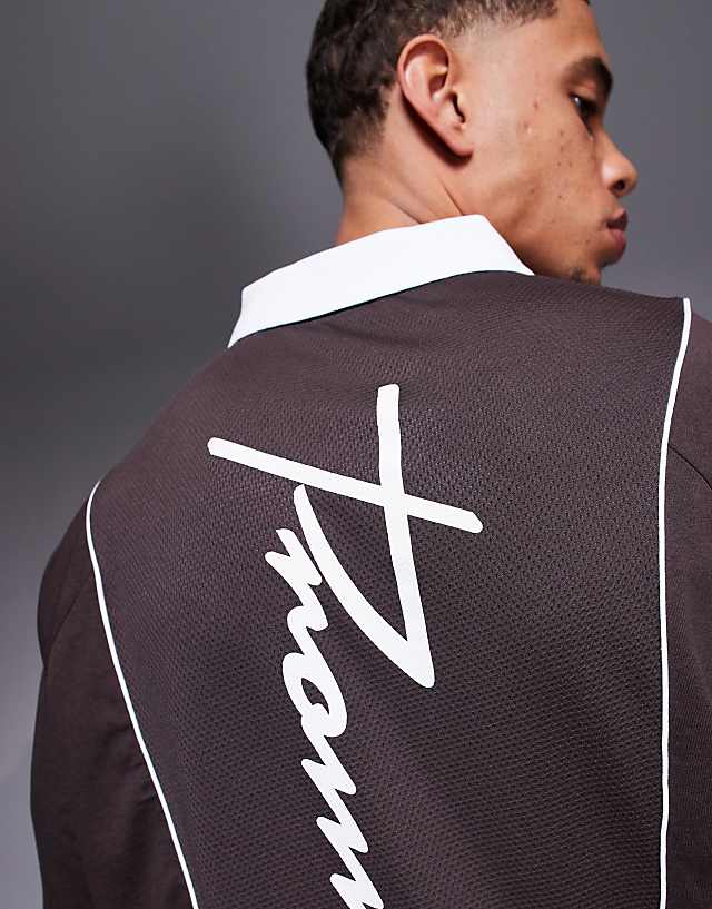 Asos ASOS DESIGN Oversized Polo With Sports Graphics And Airtex Panelling In Brown