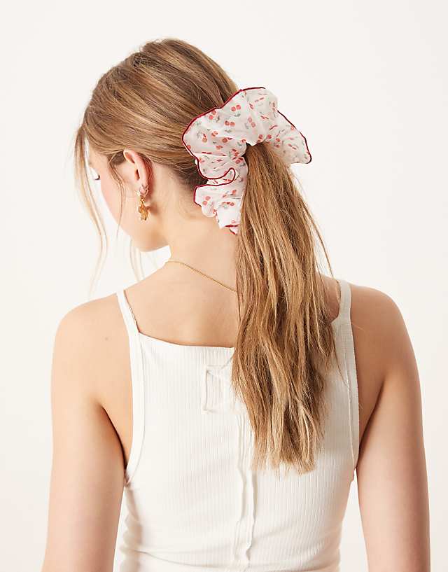 Asos ASOS DESIGN Oversized Scrunchie With Cherry Print And Contrast Binding In Red