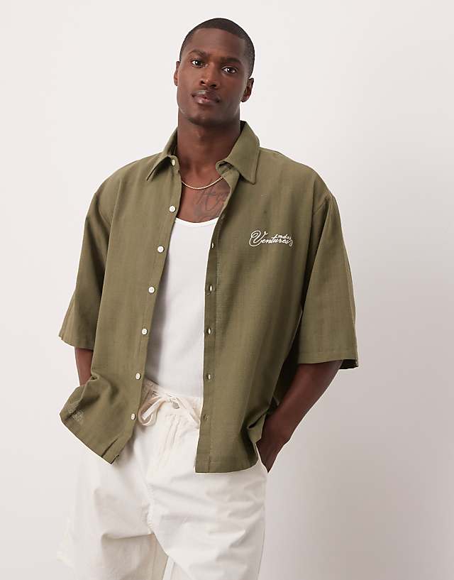 asos ASOS DESIGN oversized short sleeved shirt with chest embroidery detail in khaki linen look