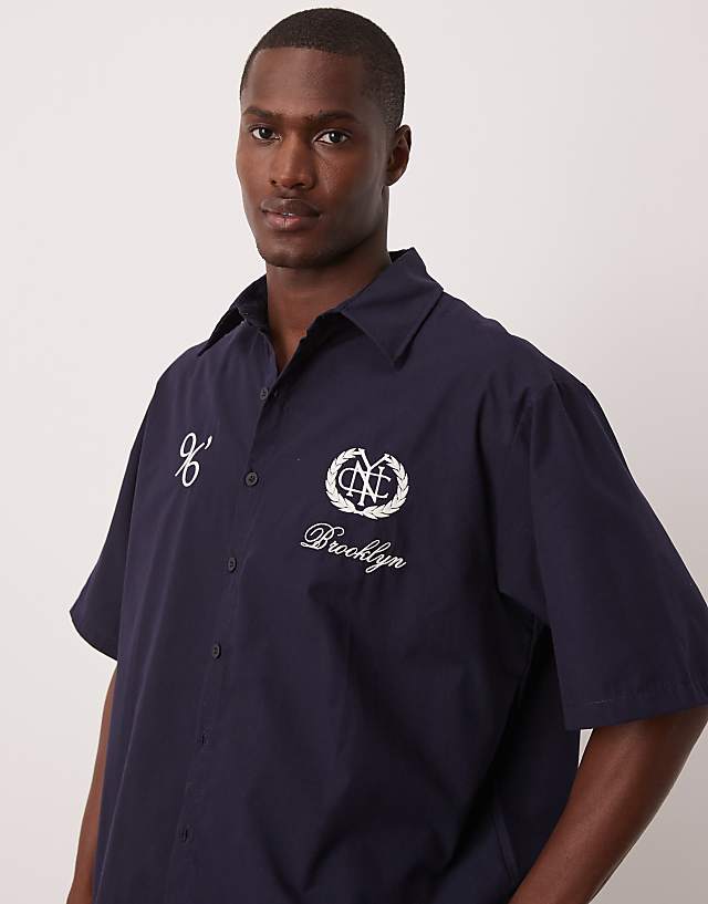 asos ASOS DESIGN oversized stripe shirt with embroidery in navy
