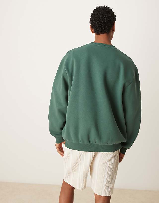 Asos ASOS DESIGN Oversized Sweatshirt With Embroidery And Print Chest In Green