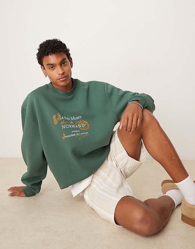 asos ASOS DESIGN oversized sweatshirt with embroidery and print chest in green