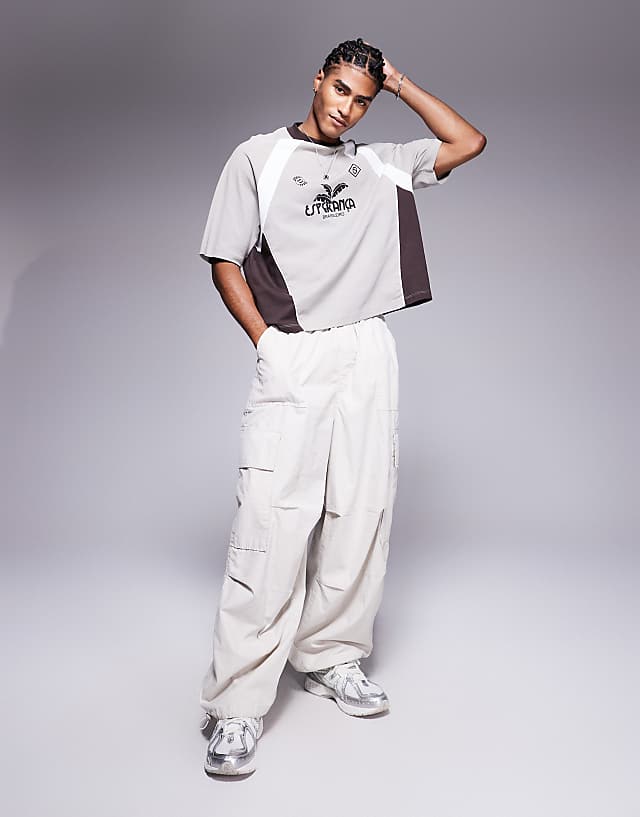 Asos ASOS DESIGN Oversized T-shirt With Cut And Sew Tee And Sports Graphic In Grey