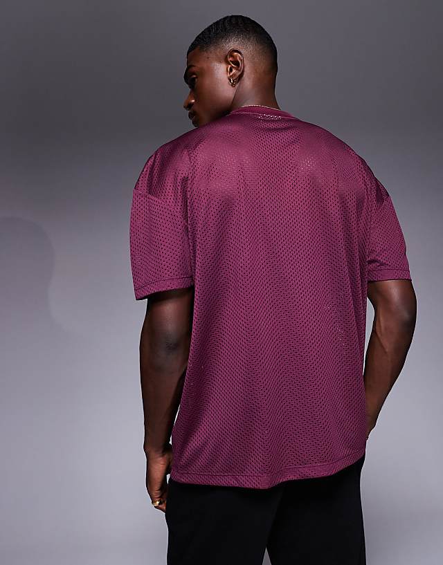 Asos ASOS DESIGN Oversized T-shirt With Dropped Shoulder And Sports Graphic In Burgundy Mesh