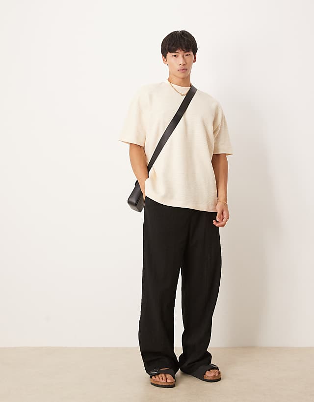 Asos ASOS DESIGN Oversized T-shirt With Henley Neck In Cream Boucle