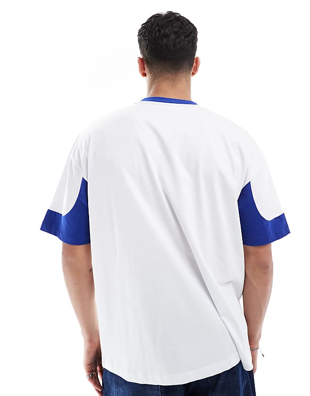 Asos ASOS DESIGN Oversized T-shirt With Panelling And Sports Graphic In White