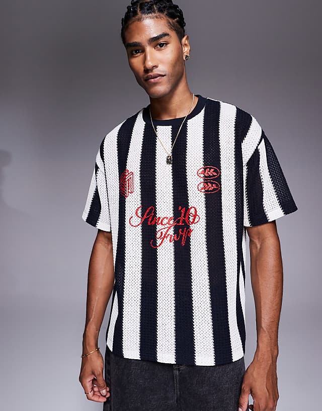 asos ASOS DESIGN oversized t-shirt with sports graphic in black and white striped crochet