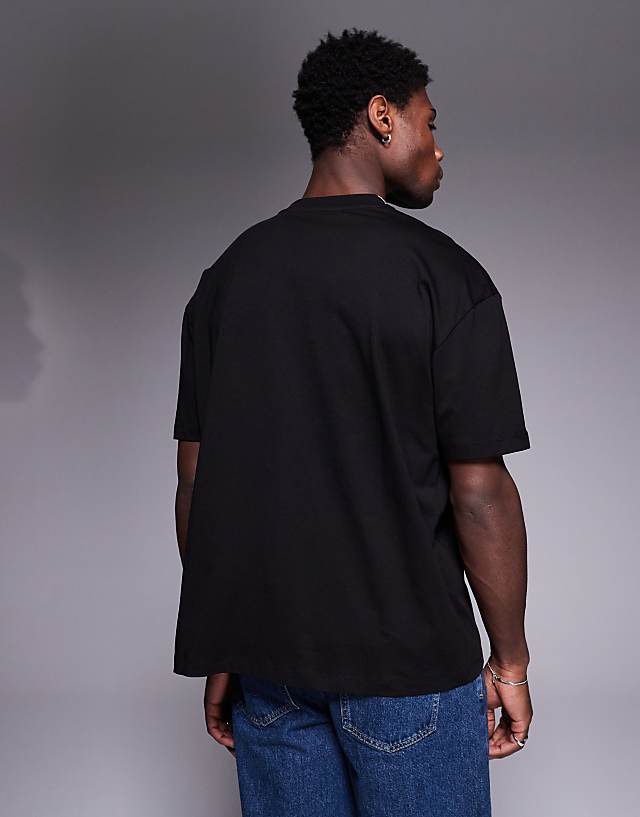 Asos ASOS DESIGN Oversized T-shirt With Sports Graphic In Black