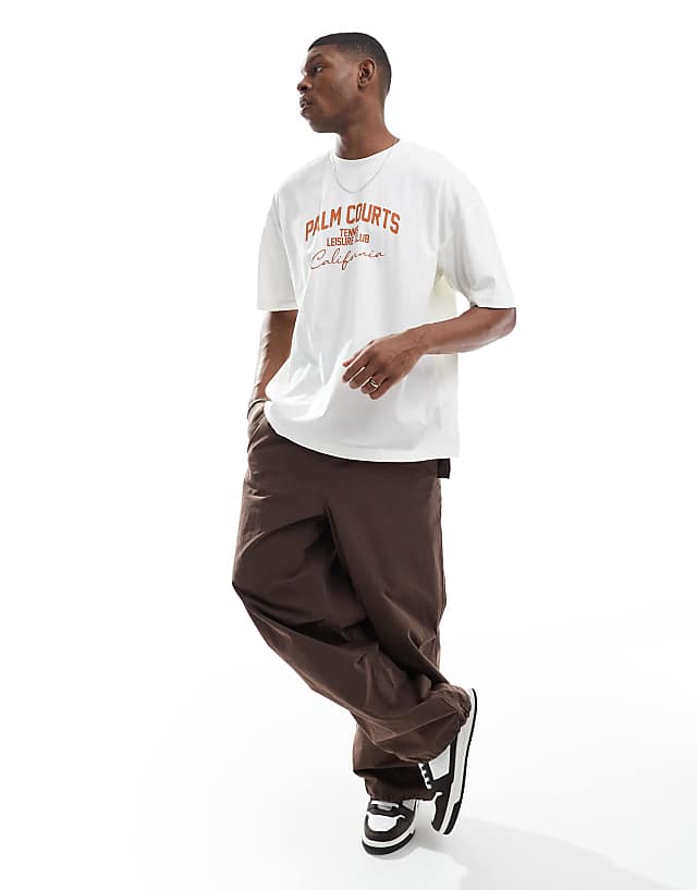 Asos ASOS DESIGN Oversized T-shirt With Sports Graphic In Cream