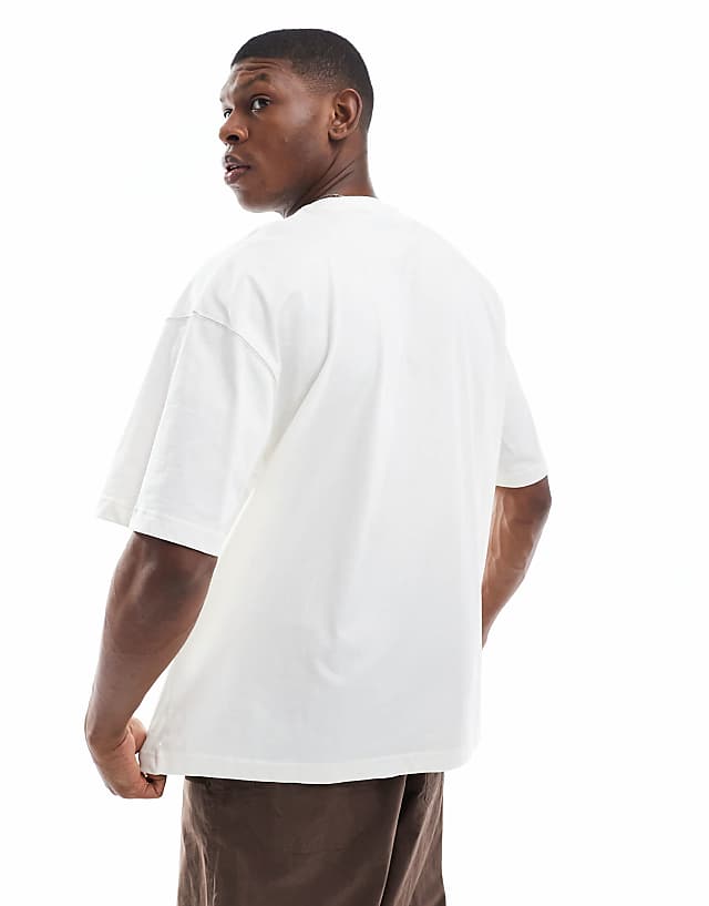 Asos ASOS DESIGN Oversized T-shirt With Sports Graphic In Cream