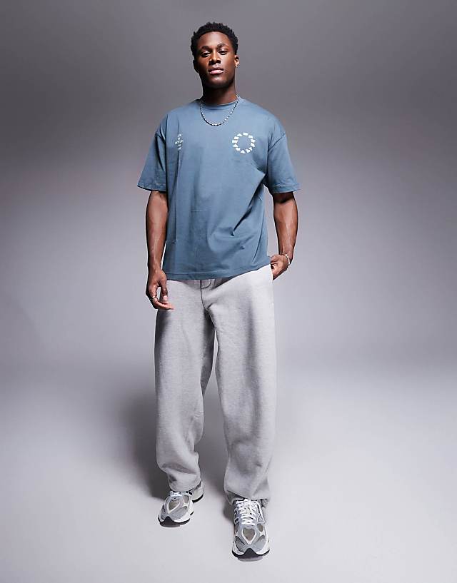 Asos ASOS DESIGN Oversized T-shirt With Sports Graphics In Charcoal