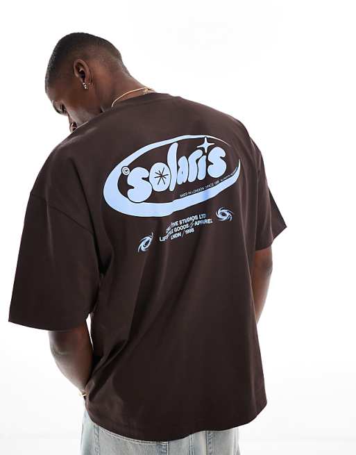 asos ASOS DESIGN oversized t-shirt with text graphic in brown