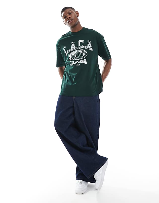 Asos ASOS DESIGN Oversized T-shirt With Varsity Graphic In Dark Green