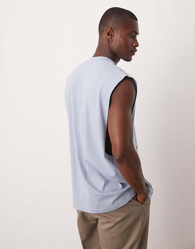 Asos ASOS DESIGN Oversized Tank With Dropped Armhole And Street Graphic In Light Blue