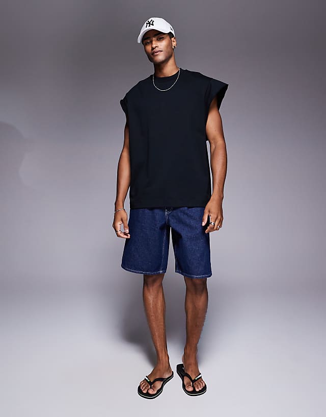 Asos ASOS DESIGN Oversized Tank With Raw Hem Sleeve In Black