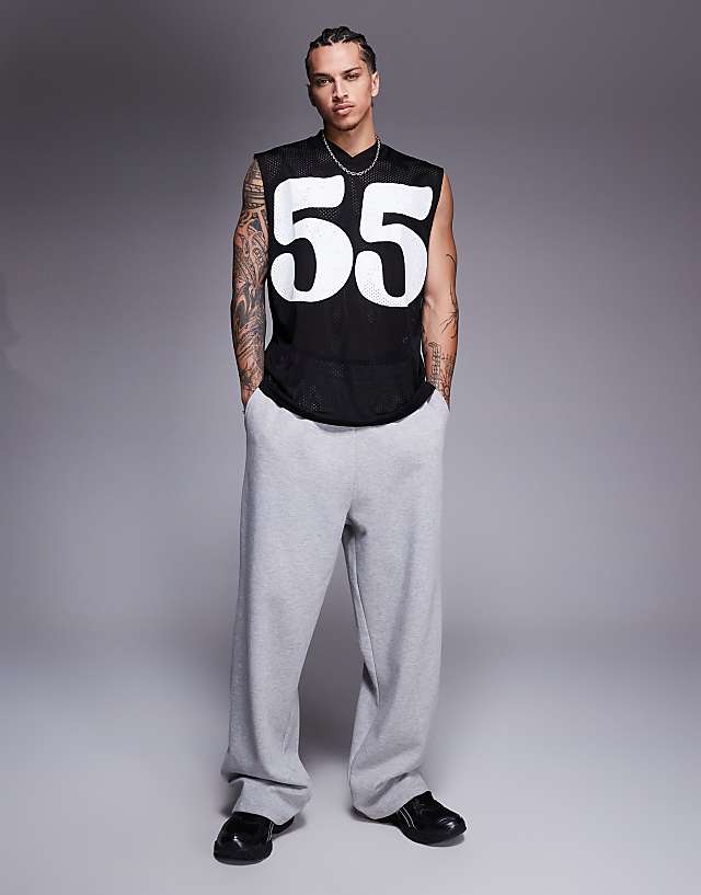 Asos ASOS DESIGN Oversized Tank With Sports Graphic In Black Mesh