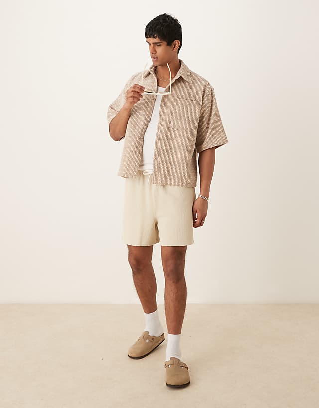 Asos ASOS DESIGN Oversized Textured Shorts In Beige