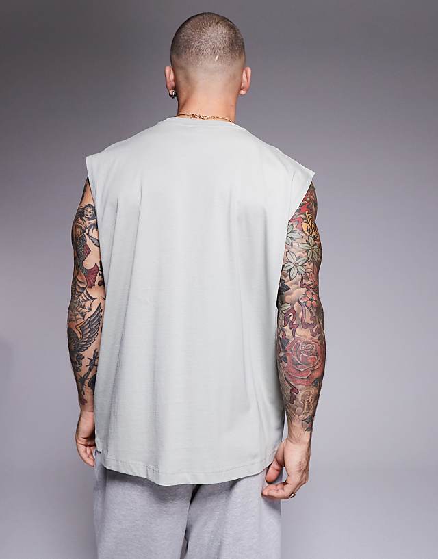 Asos ASOS DESIGN Oversized Vest With Front Sports Graphic In Light Grey