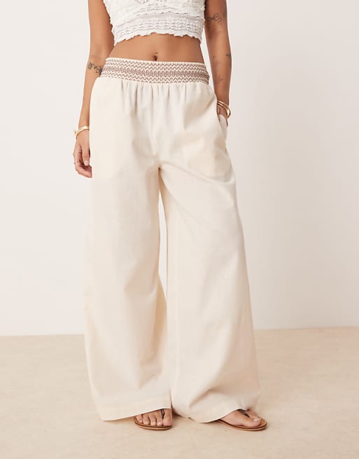 Asos ASOS DESIGN Petite Linen Blend Pull On Wide Leg Trousers With Shirred Waist Detail In Cream With Brown