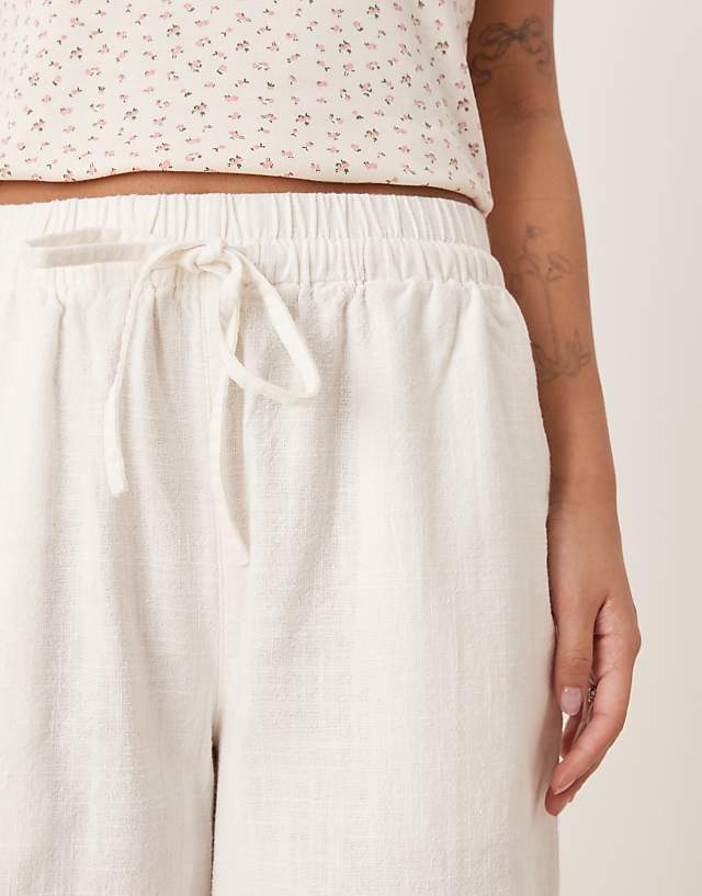 Asos ASOS DESIGN Petite Linen Look Pull On Trouser In Off White