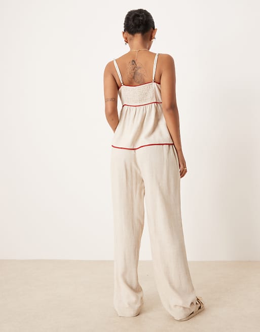 Asos ASOS DESIGN Petite Pleat Front Tapered Trousers With Linen In Stone