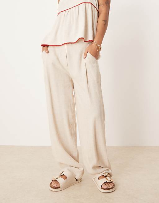 Asos ASOS DESIGN Petite Pleat Front Tapered Trousers With Linen In Stone