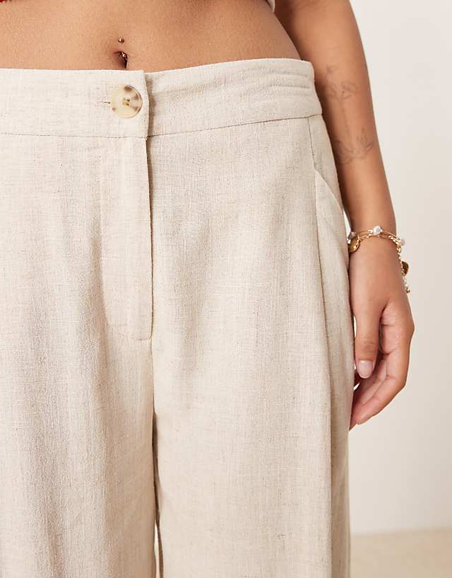 Asos ASOS DESIGN Petite Pleat Front Tapered Trousers With Linen In Stone