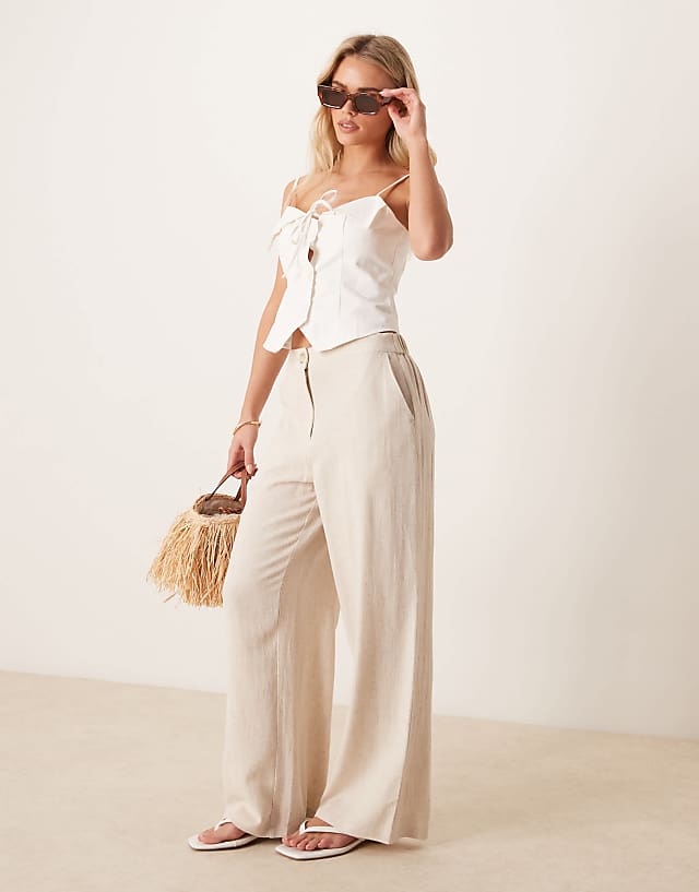 asos ASOS DESIGN Petite relaxed straight leg trousers with linen in stone