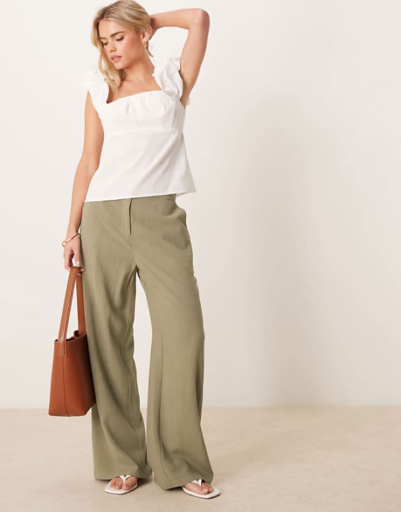 asos ASOS DESIGN Petite relaxed straight leg trousers with linen in khaki