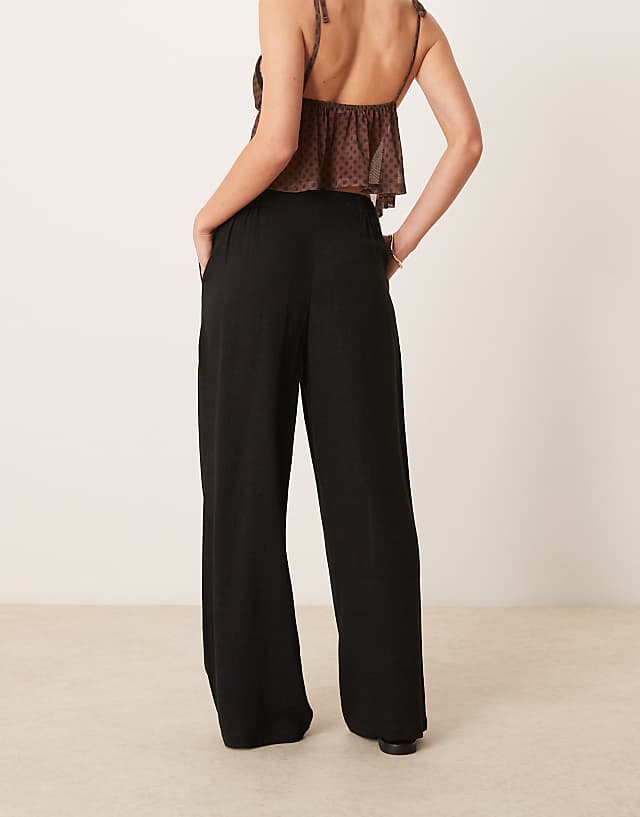 Asos ASOS DESIGN Petite Relaxed Straight Leg Trousers With Linen In Black