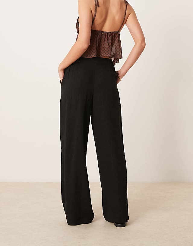 Asos ASOS DESIGN Petite Relaxed Straight Leg Trousers With Linen In Black