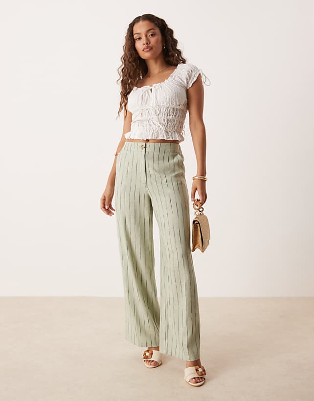 asos ASOS DESIGN Petite relaxed straight leg trousers with linen in sage squiggle stripe