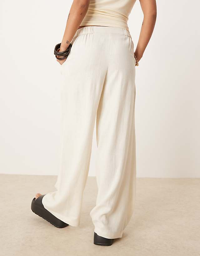 Asos ASOS DESIGN Petite Relaxed Straight Leg Trousers With Linen In Off White