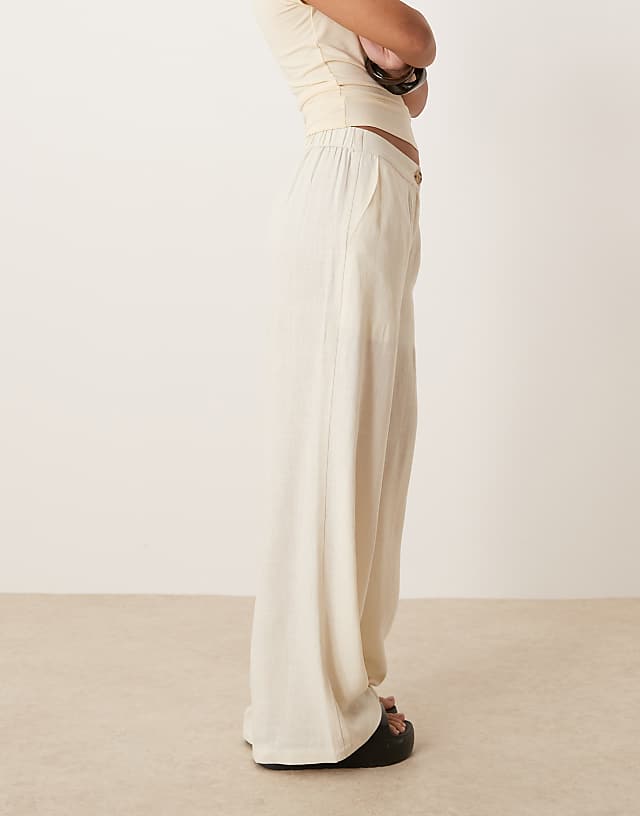 Asos ASOS DESIGN Petite Relaxed Straight Leg Trousers With Linen In Off White